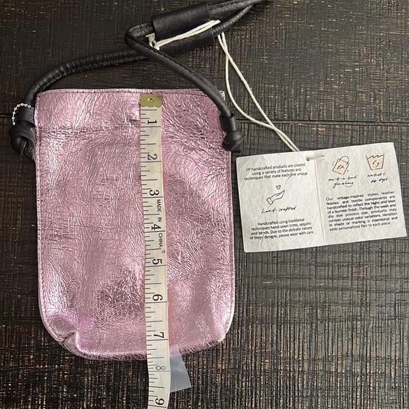 Free People Crossbody style, metallic leather fabrication, pouch design. - Picture 6 of 8